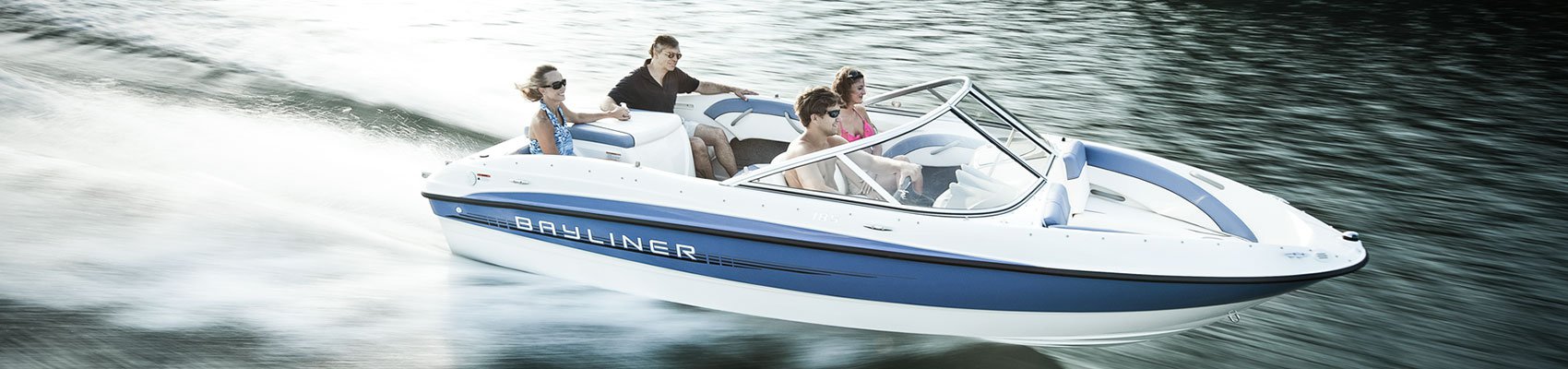 sterndrives & inboards whit white small boat on board
